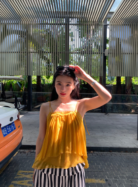 落落狷介 绝美小吊带上衣2026新款设计感小众黄色吊带背心外穿女
