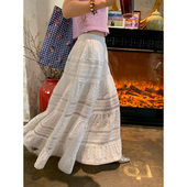 落落狷介 春夏半身裙穿搭a字2025年新款 设计感小众镂空白色裙子