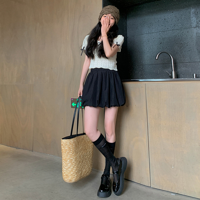 黑色花苞短裙女2026夏季新款高腰a字泡泡蓬蓬裙小个子蛋糕半身裙