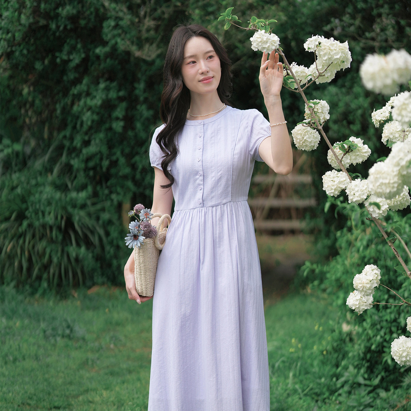 纻衣文艺风气质连衣裙女2026年夏新款提花设计感收腰显瘦系带裙子