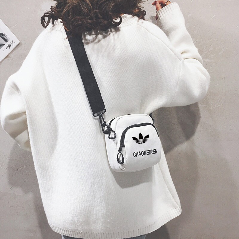 品牌正品小胸包女白色休图片
