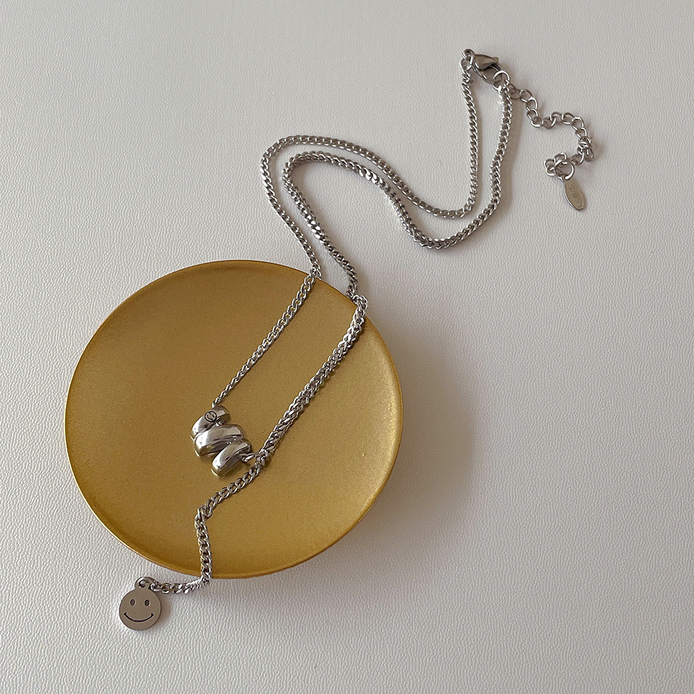 法式冷淡风不规则笑脸吊坠项链女