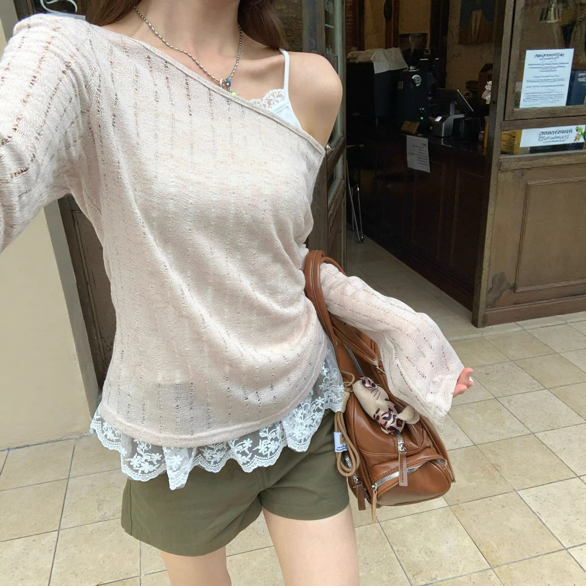 实拍杏色不规则斜肩长袖T恤女春季高级绝美薄款宽松拼接抽绳上衣