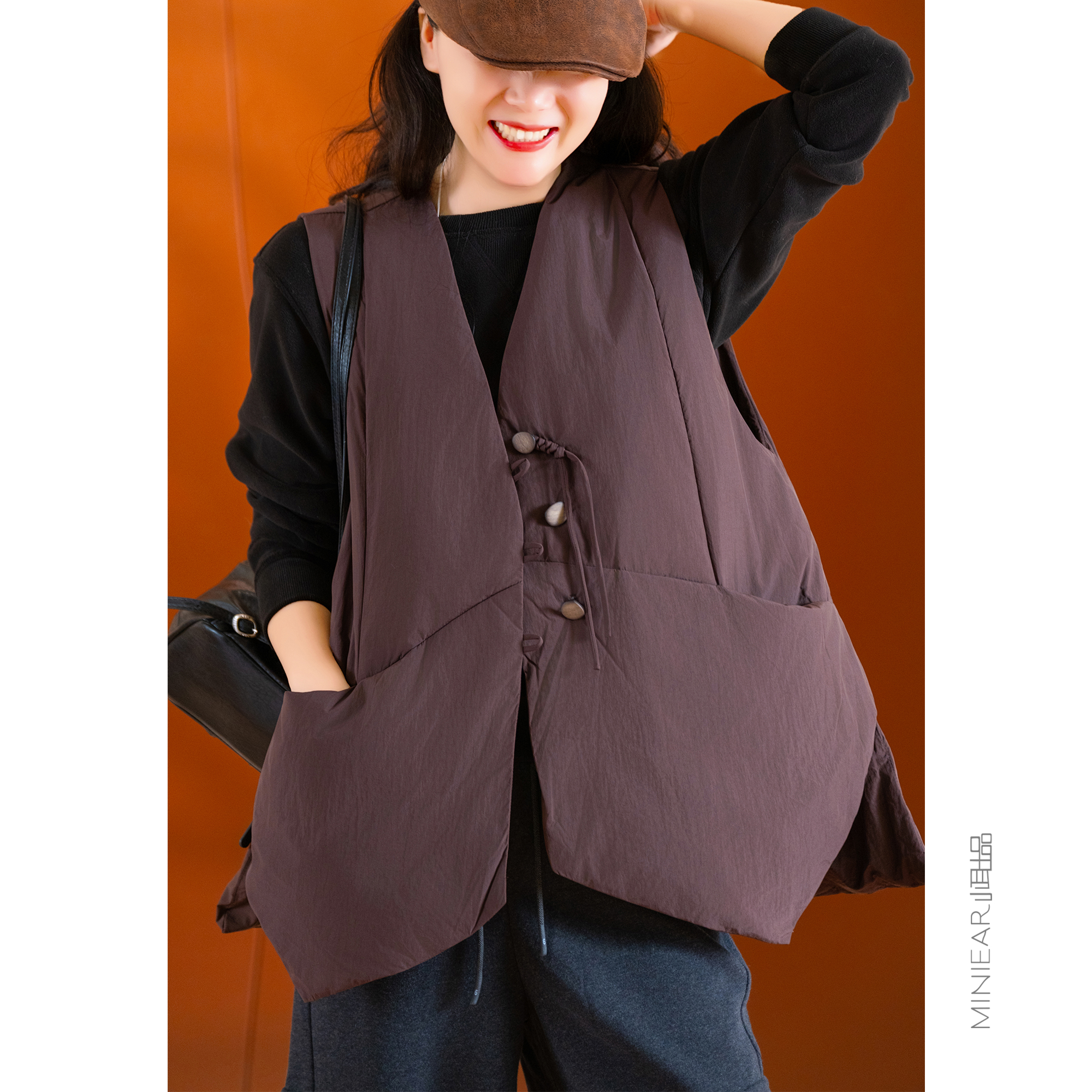 纯色流苏盘扣羽绒马甲