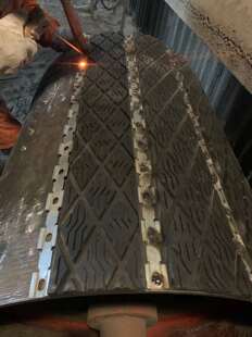 橡胶板插片输送机滚筒包皮1518厚阻燃耐磨现场安装防滑焊接黑菱u.