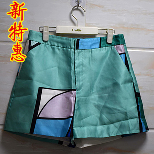 打折清仓特价知名品牌女装样衣绿色亮面韩版显瘦春秋短裤包邮夏