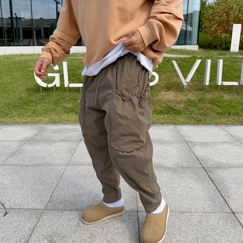 小北韩国代购男装东大门休闲裤松紧腰阔腿弧形工装大口袋设计长裤