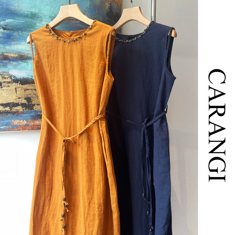 CARANGI品牌-2025夏季无袖连衣裙宽松纯色度假风百搭长裙IG7665