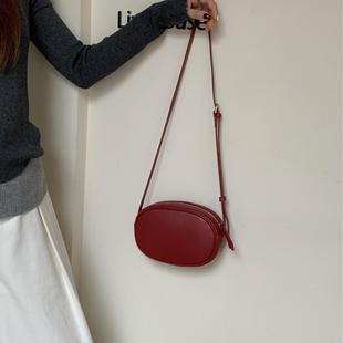 高级感简约小圆饼包女单肩包羊皮小包包斜挎真皮包包百搭韩系女包