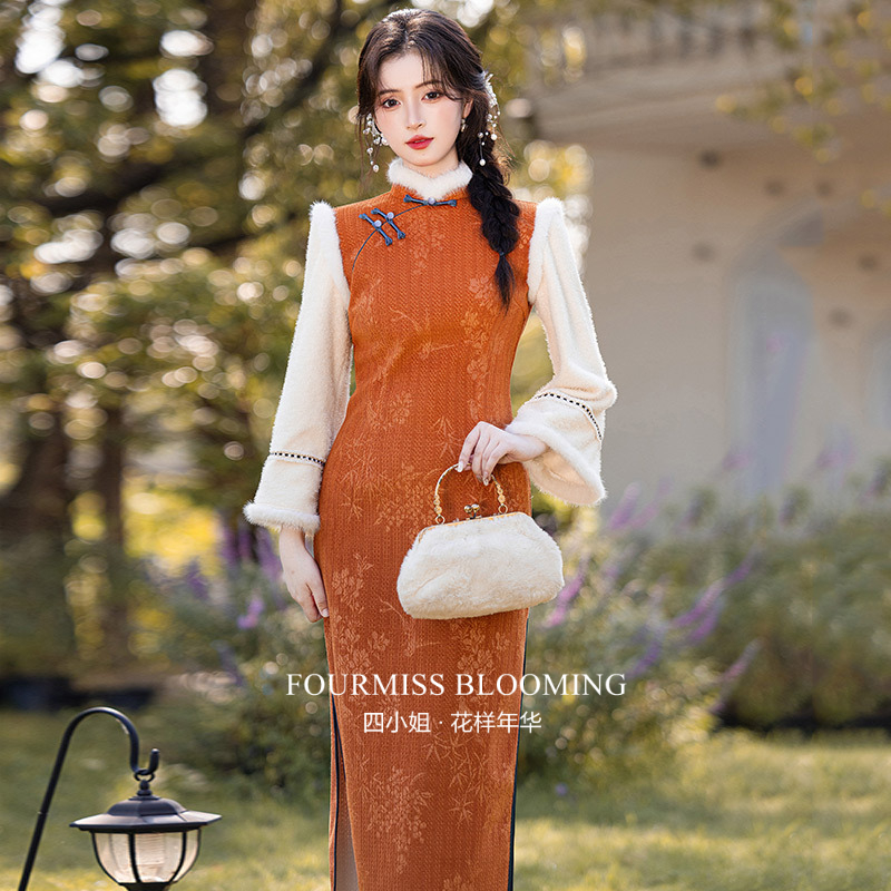 橘黄加绒拜年服女款2025