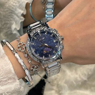 女士高端手表高品质圆形日月星辰镶钻时尚女表带钢带陶瓷腕表轻奢