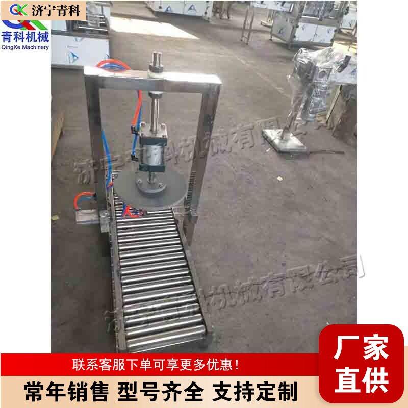 全自动润滑油桶封口设备 日化用品塑料桶压盖机 无动力辊筒封桶机