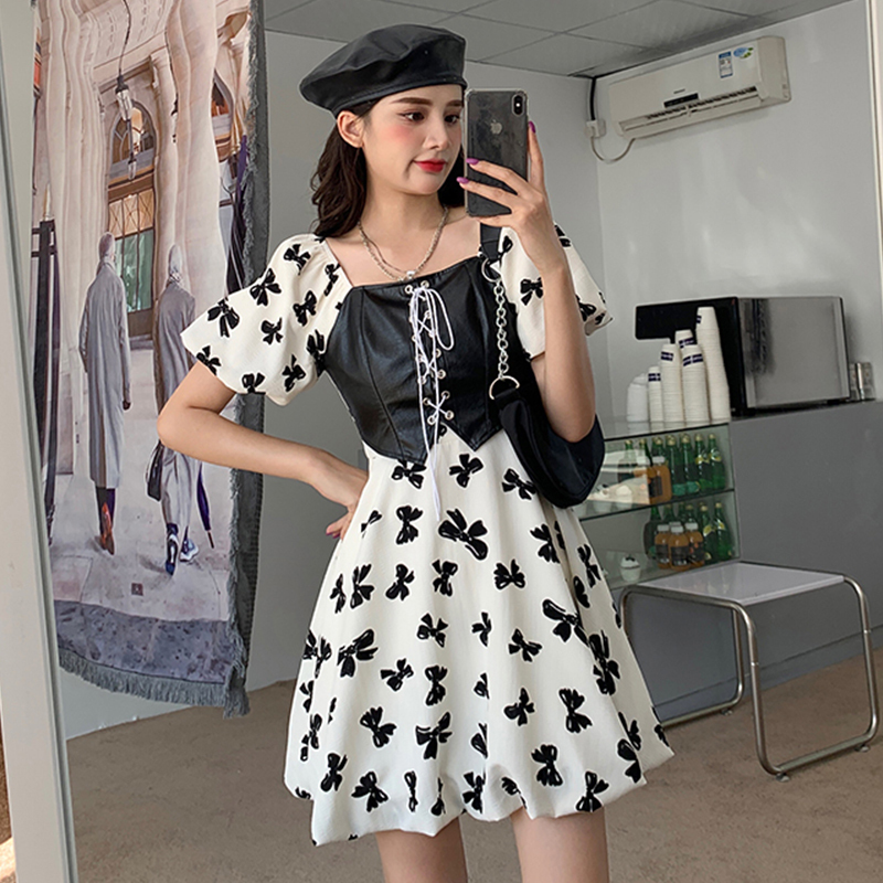 Two fake bowknot bubble sleeve waist flower bud dress
