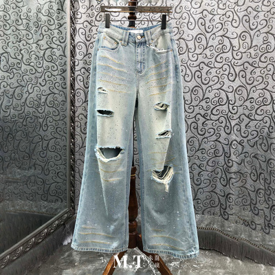 米兰小镇南油高版本个性街头前面大破洞做旧破坏烫钻牛仔长裤C31