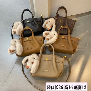 康泰娜手提饺子包韩版女包2025新款小众时尚百搭休闲兔子斜挎包