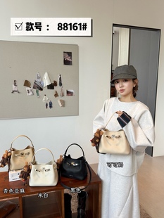 康泰娜爆款手提包女包2026新款时尚休闲水桶高级洋气通勤斜挎包