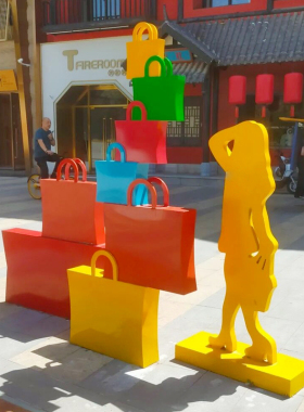 玻璃纤维剪影购物人物雕塑商场步行街拍照创意袋子大型卡通落地摆