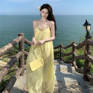 夏季 海边度假风黄色露背吊带连衣裙子女装 收腰显瘦高级感绝美长裙