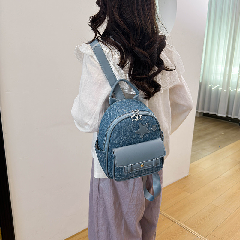 少女风星星牛仔拼接双肩包蓝色