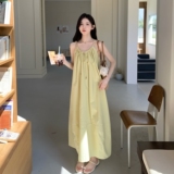海边度假风黄色吊带连衣裙女2025夏季新款气质超好看露背沙滩长裙，女装连衣裙，浙宝239