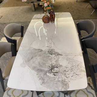 意式轻奢岩板餐桌现代简约高端轻奢亮光岩板长方形不锈钢餐桌椅
