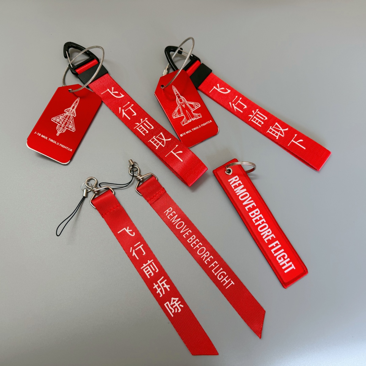 中国战斗机挂牌飞行前拆除安全插销飘带机组飞行装饰飘带钥匙扣