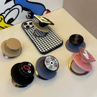泡泡骚通用站立体手机气囊支架啪嗒磁吸支架可伸缩适配popsockets