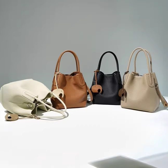 小众设计轻奢高级感真皮女包牛皮荔枝纹水桶包菜篮子包单肩斜挎包,箱包皮具/热销女包/男包,通用款女包,淘宝优惠券,粉丝福利购,淘宝优惠卷