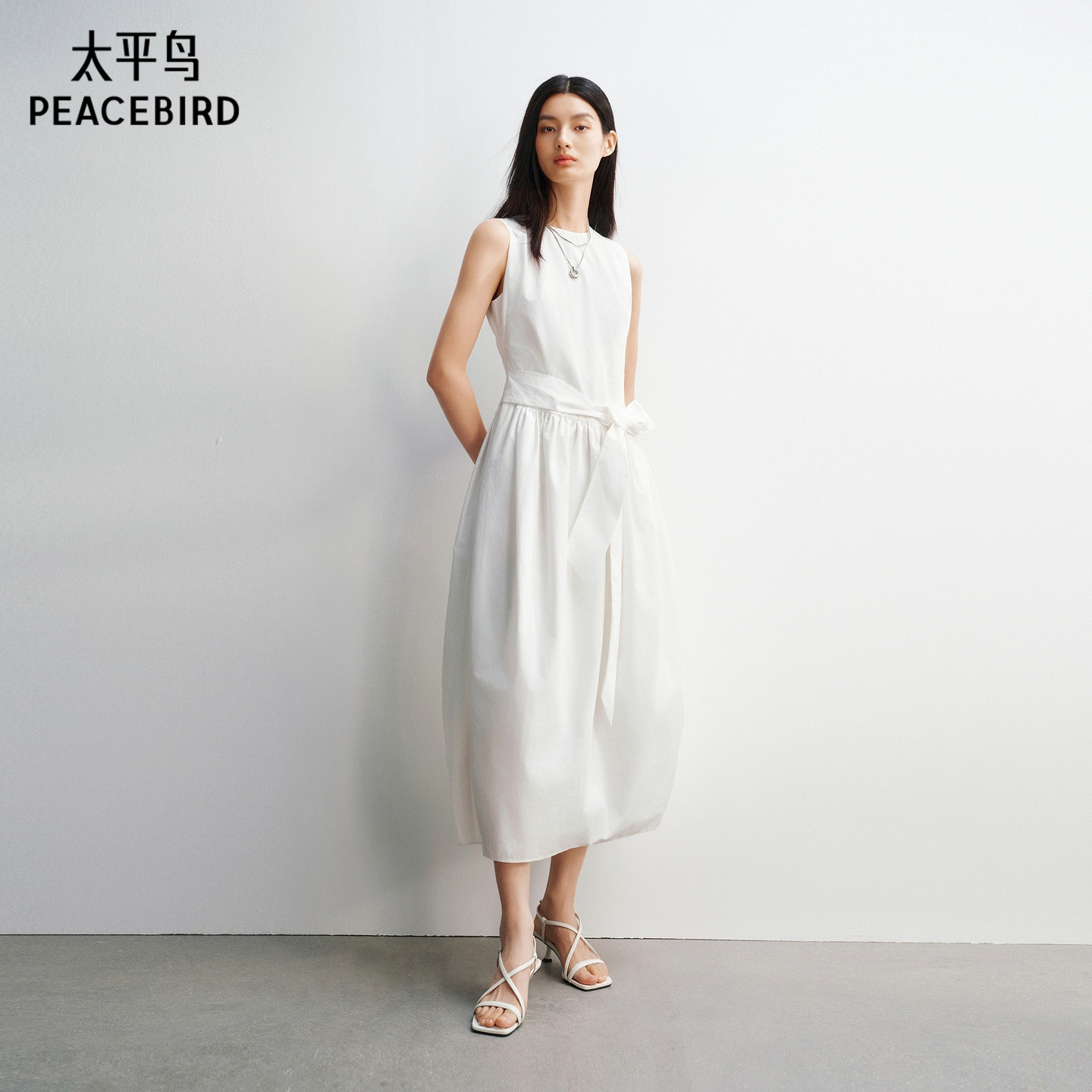 太平鸟白色无袖花苞裙型连衣裙2026春夏装新款品质高级好看长裙女