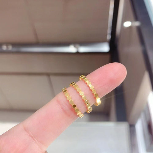 钛钢镀18k玫瑰金蜂窝素圈戒指女