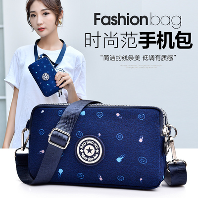 新款装手机包女斜挎包帆布零钱包