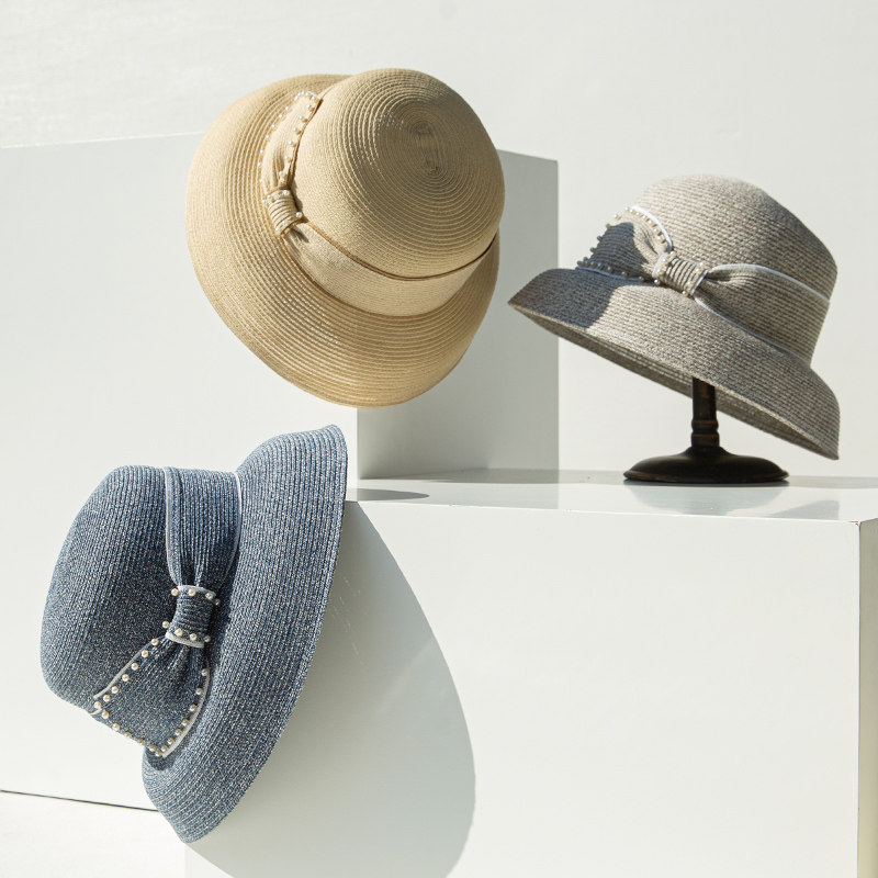 诗丹凯萨夏季新款编织草帽蝴蝶结优雅户外出行复古赫本风盆帽女