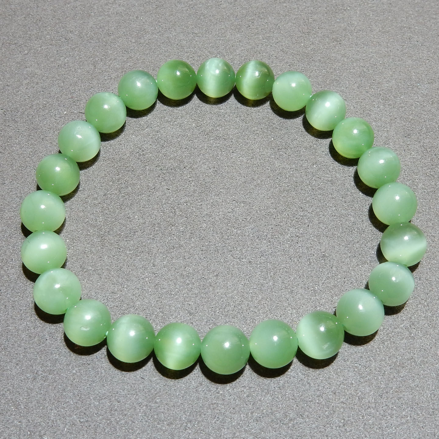 震惊方言和田玉精品俄罗斯老料灵动猫眼粉绿碧玉卡8mm圆珠手链A6