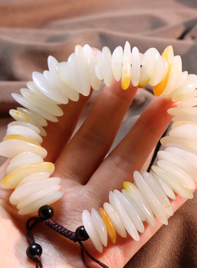 新疆金皮隔片珠白玉籽料原石手串