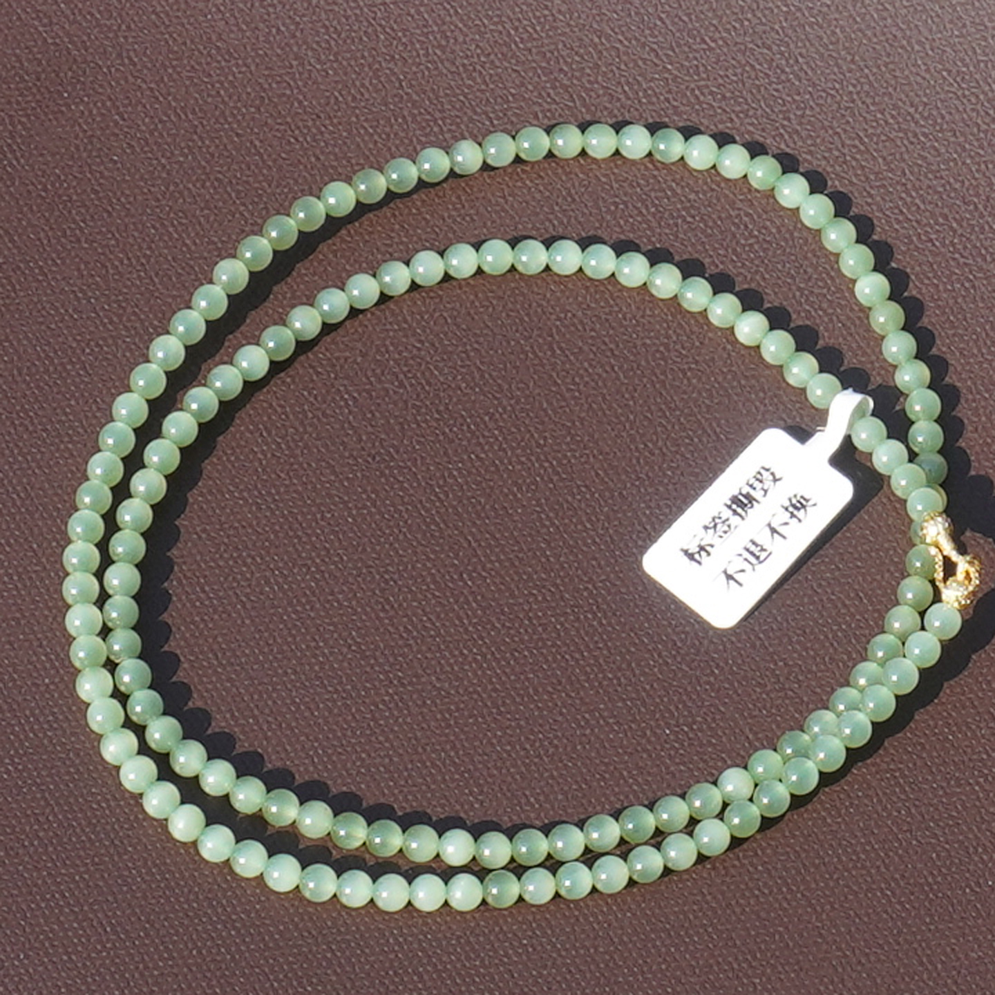 和田玉俄料冰底细腻粉青碧玉猫眼