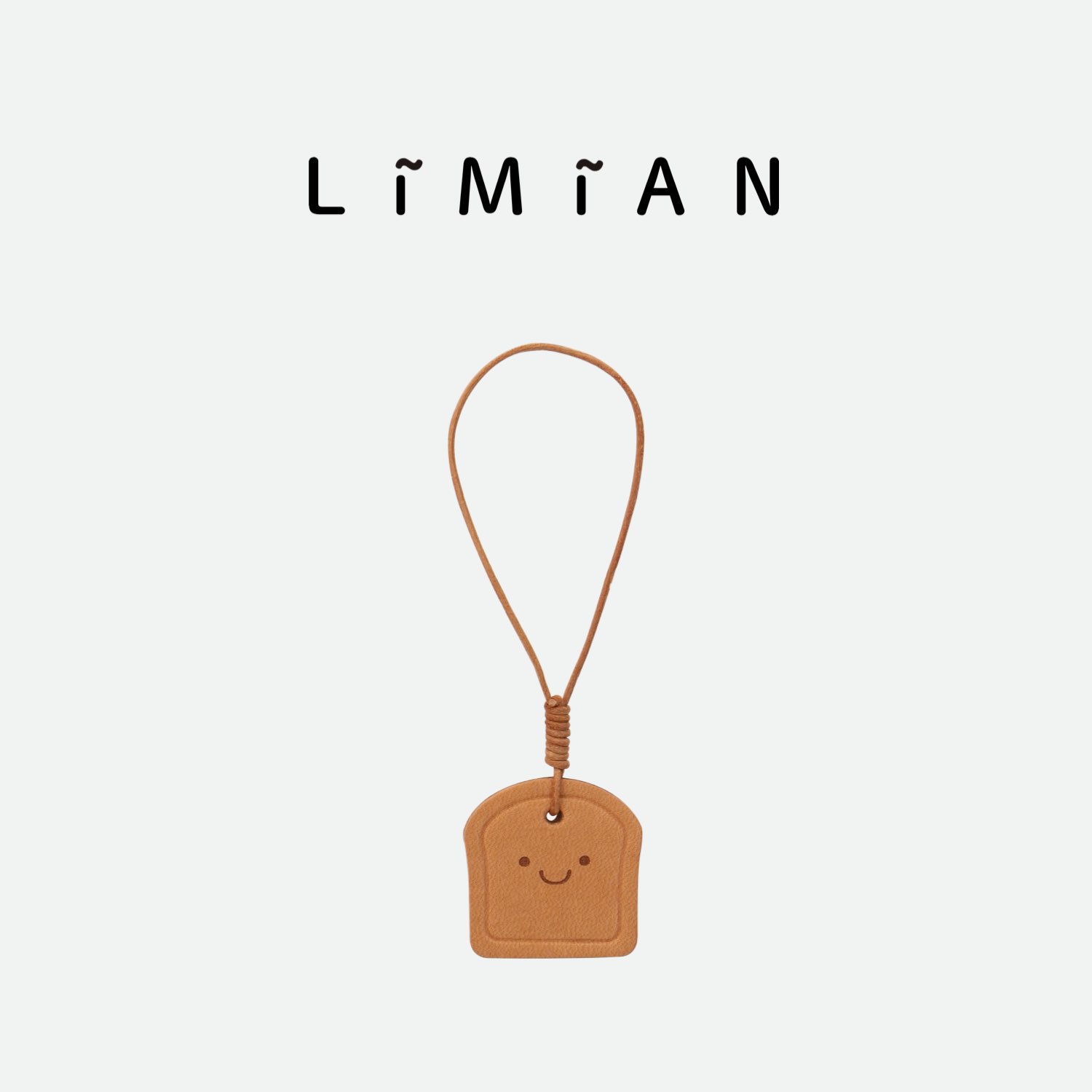 里面LM微笑吐司皮质挂件