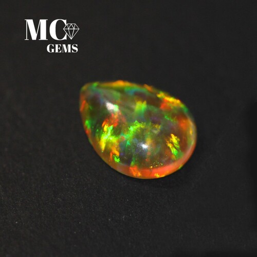 皇家欧泊石黄欧泊石梨形素面7X9mm平底弧面澳宝石未镶嵌裸石戒面