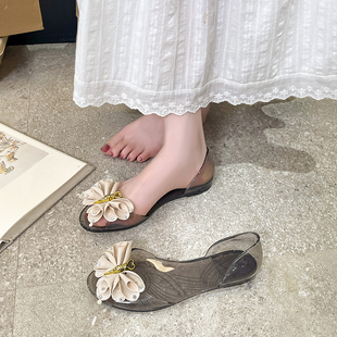 韩版鱼嘴果冻鞋女平底夏天花朵透明水晶塑料凉鞋包跟配裙子沙滩鞋