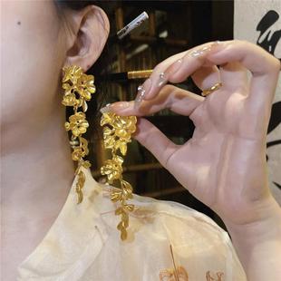 轻奢设计感仿真黄金色花朵流苏耳环女长款小众夸张复古显脸小耳饰