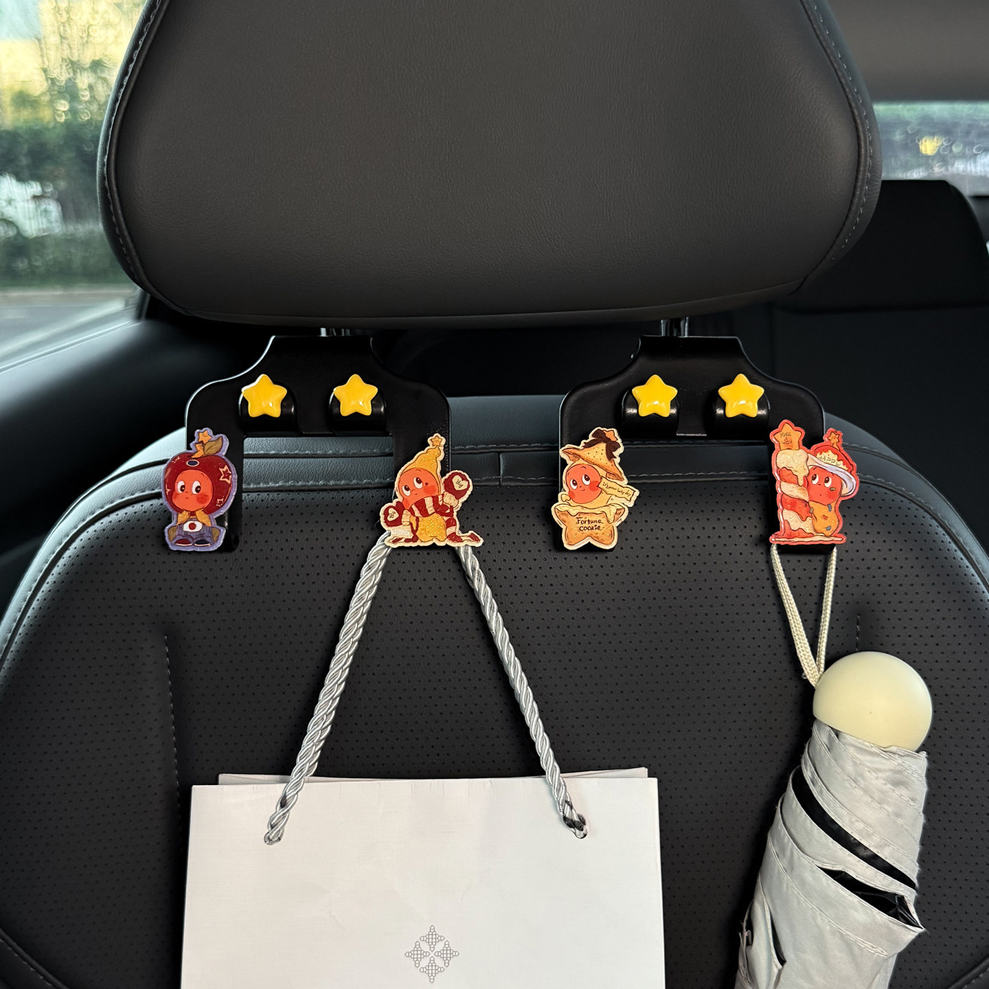 车载椅背星星人双挂钩收纳图片