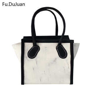 翅膀包 黑白 熊猫包 Fu.DuJuan 手提包 气质 经典 牛皮手拧包 原创