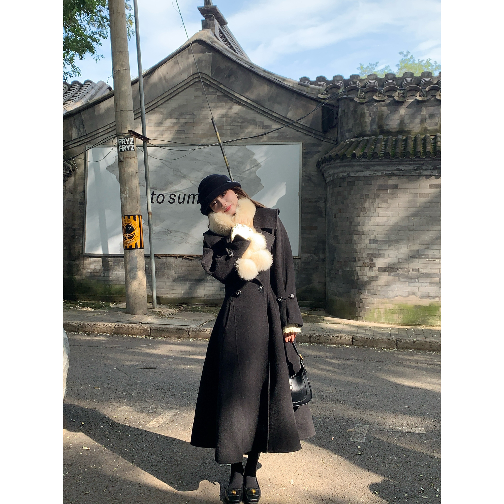 Thecoco 100澳毛收腰黑色双面呢伞摆长款大衣女冬季气质毛呢外套