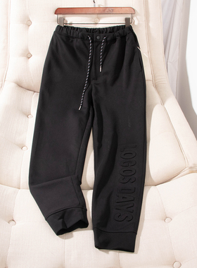 日单春秋新款时尚按扣拉链半松紧腰立体压花束口休闲裤卫裤29011