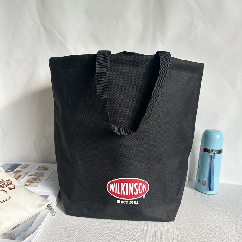 外单库存日韩经典款厚实黑色购物包手提托特包宽底防水购物收纳袋