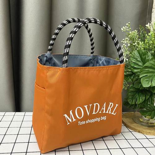 多巴胺纯色防水布手提袋饭盒包上班通勤便携手提包外出百搭妈咪包