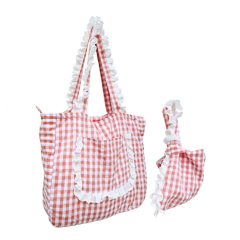 原创设计风粉色格纹学生手腕包