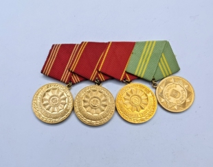 东德内政部武装力量忠诚服役奖章4联排