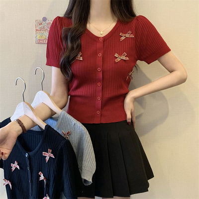 红色蝴蝶结坑条针织开衫