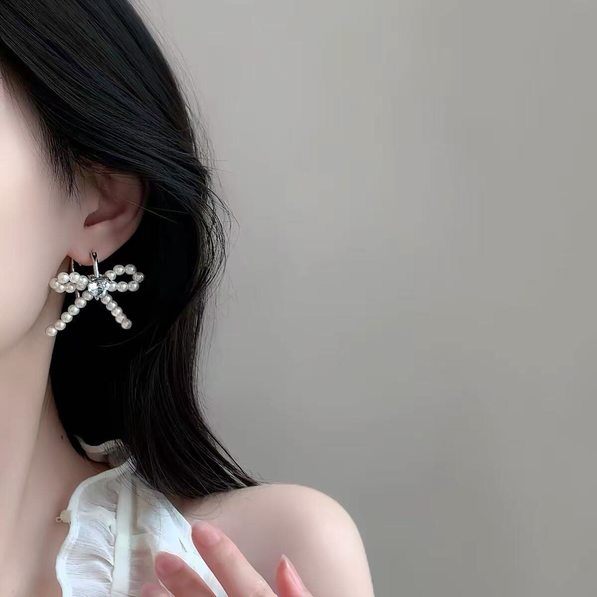 partyme手工仿珍珠闪钻蝴蝶结耳环女小众设计气质耳饰甜美网红款图片