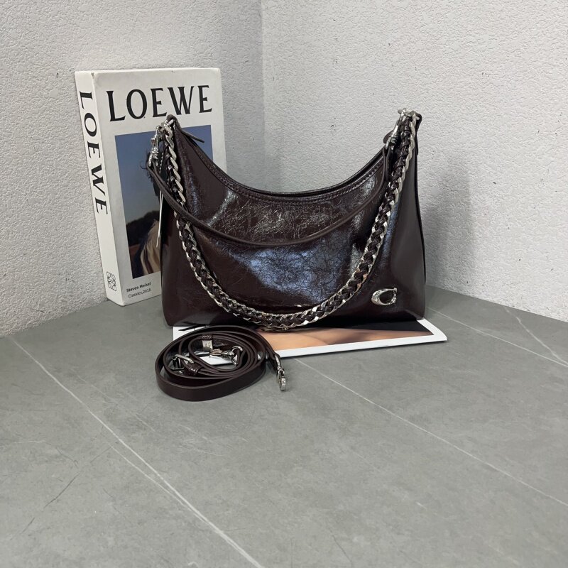 娜飞儿油蜡皮饺子包质感单肩斜跨